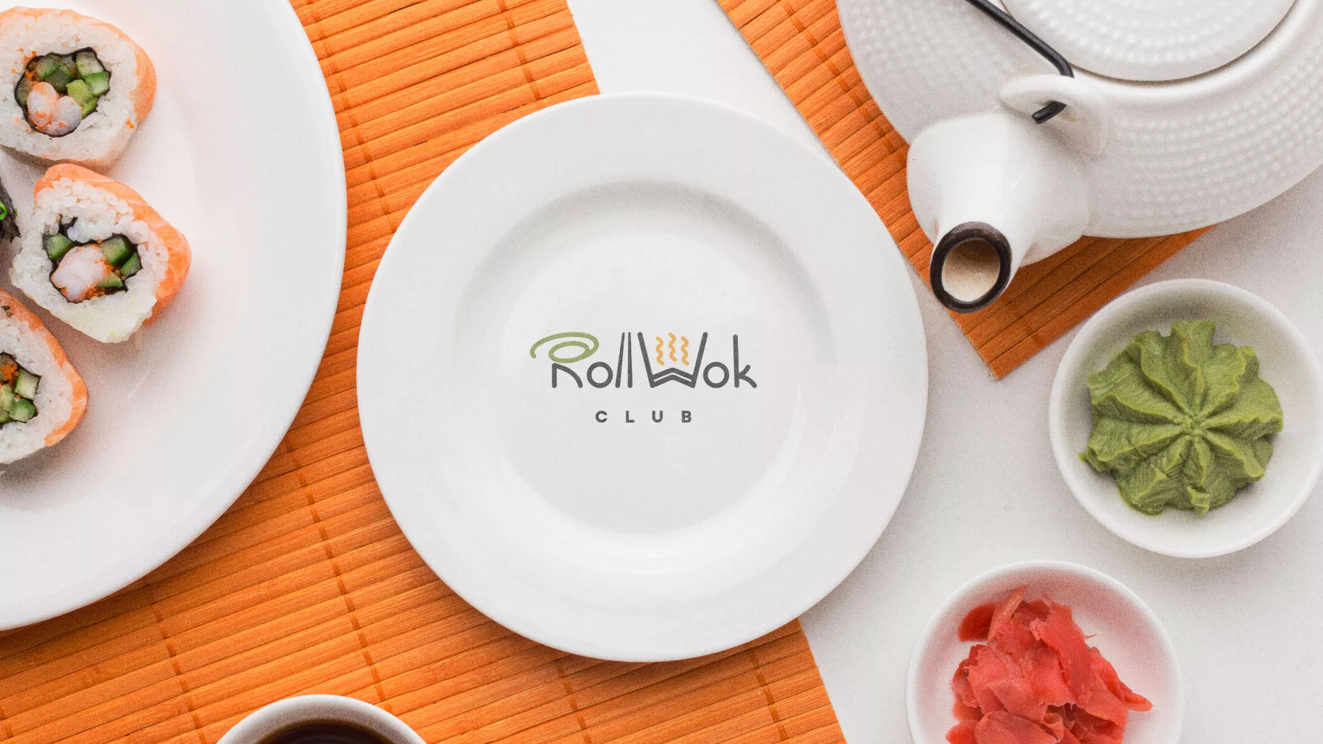 Разработка логотипа и фирменного стиля в Десногорске для суши-бара «Roll Wok Club» Разработка логотипа и фирменного стиля в Десногорске для суши-бара «Roll Wok Club»